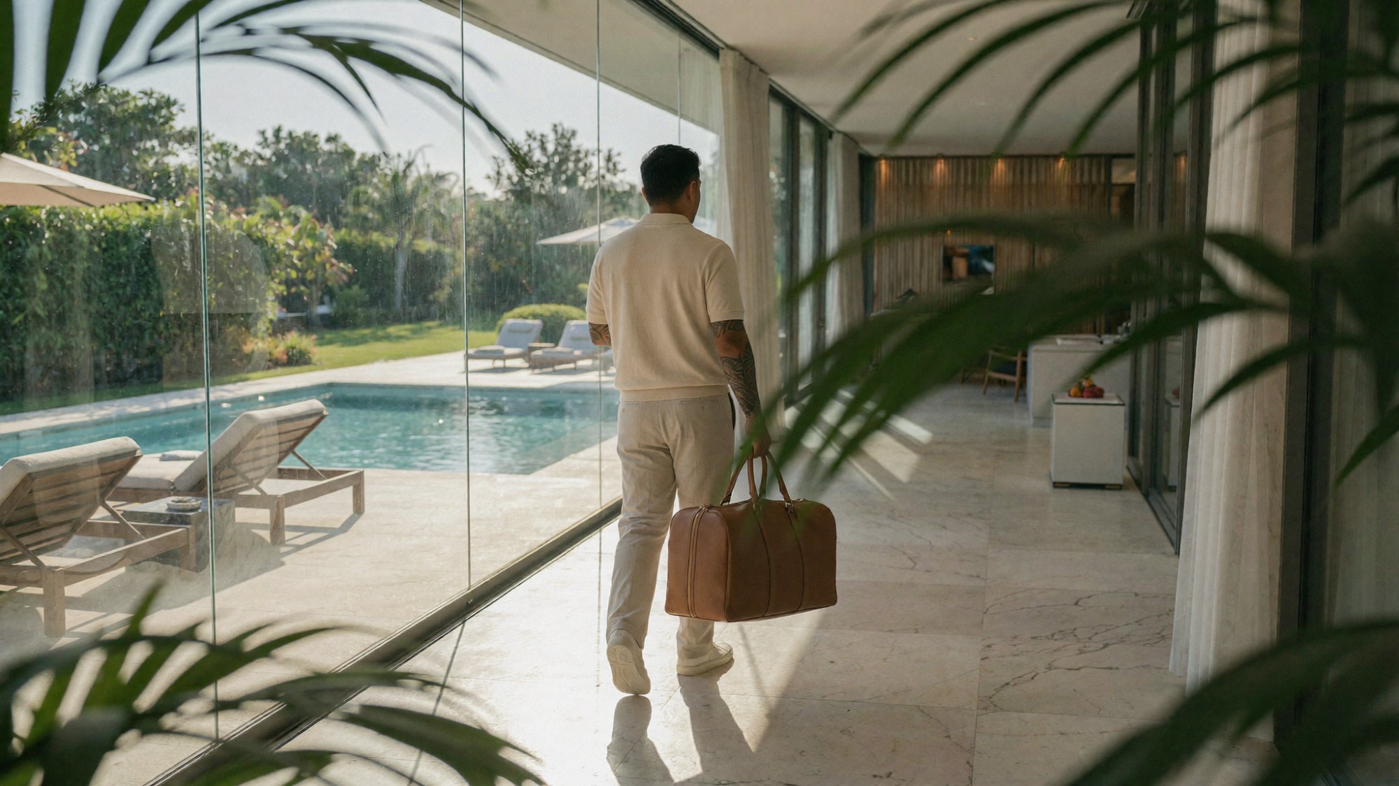 Jake working from anywhere — laptop by the ocean